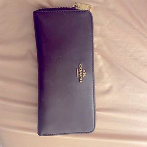 maroon colored Coach Wallet